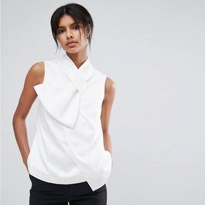 Twisted bow neck top